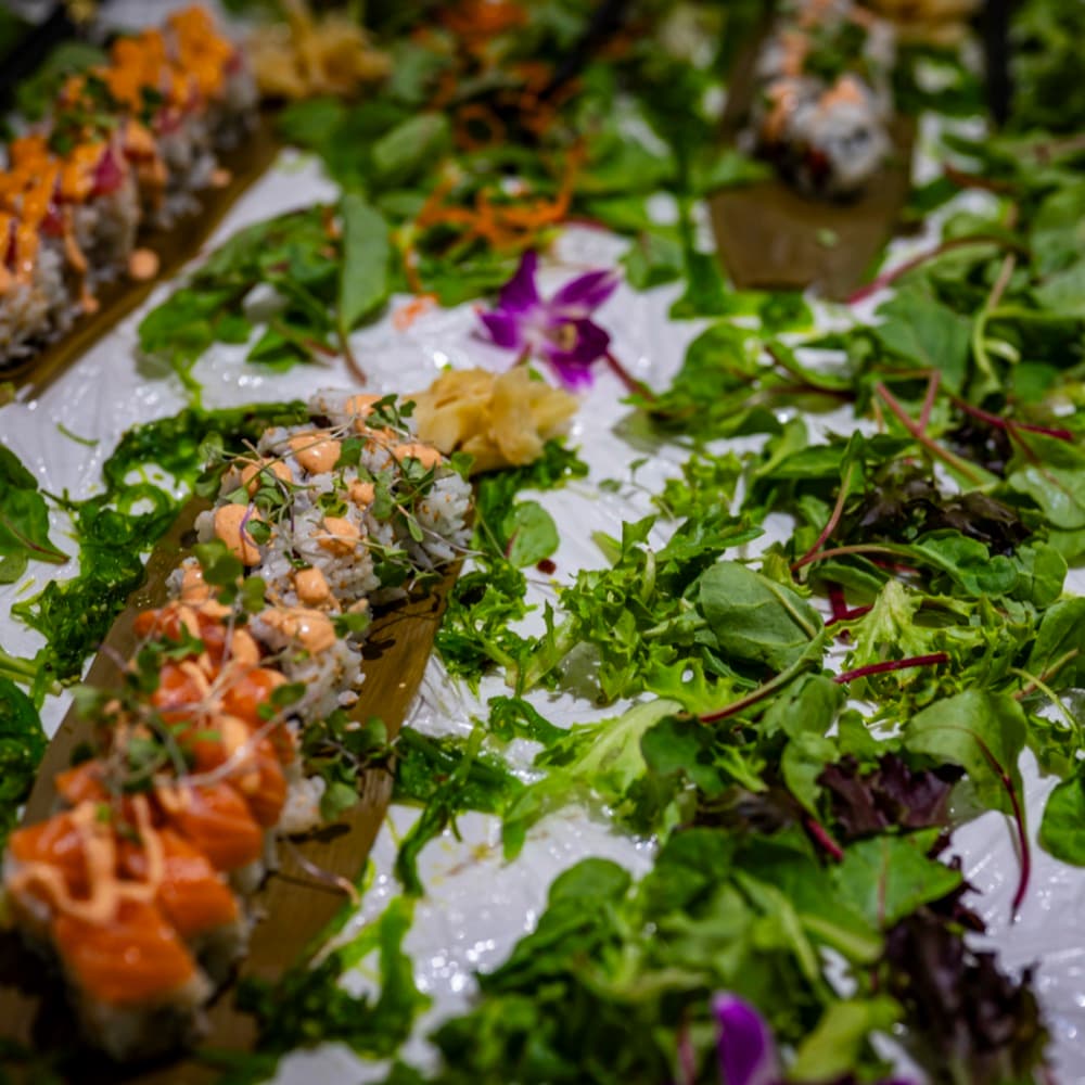 A tray of freshly rolled sushi ready for service.